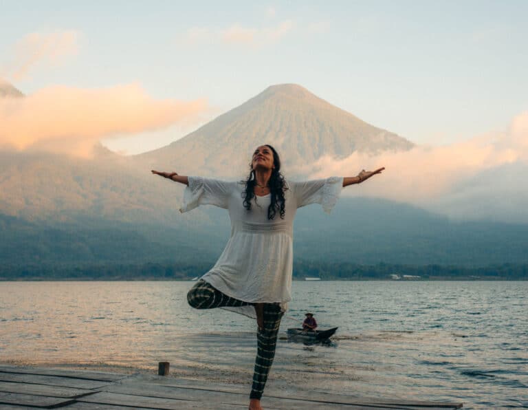 Lake Atitlan yoga retreat February 2025 Mystical Yoga Farm women on dock with volcanos